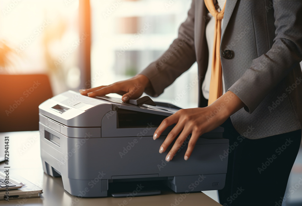 a person using a printer a person using a printer