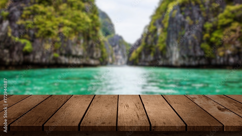 Wooden table with blurry mountain landscape in the background
