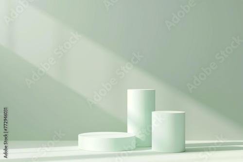 Several geometric pastel-green podiums on a monochrome background. 