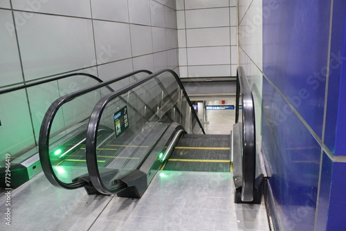 Walking eskalator running in subway station 