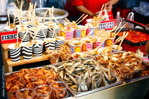 Assorted fried seafood sold at a street food cart photo