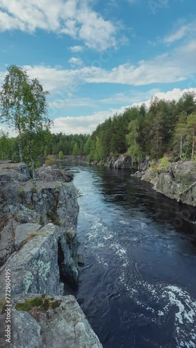 Canyon of the Nizhny Vyg river, near the Padun waterfall. A river gorge with rocks and greenery. Not far from the White Sea-Baltic Canal. Karelia, Russia 4K photo