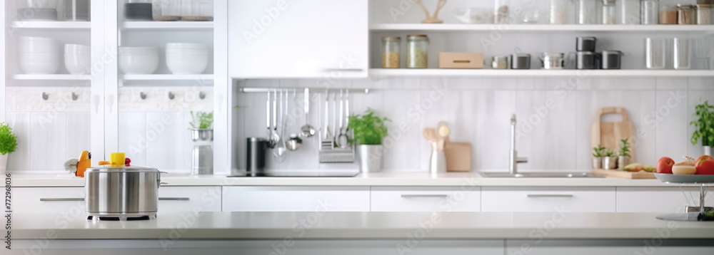 Blur selective focus of white kitchen counter island.contemporary background for food key visual product.cooking and eating concepts Blur selective focus of white kitchen counter island.contemporary background for food key visual product.cooking and eating concepts