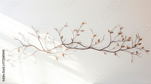 Vase with tree branch on table