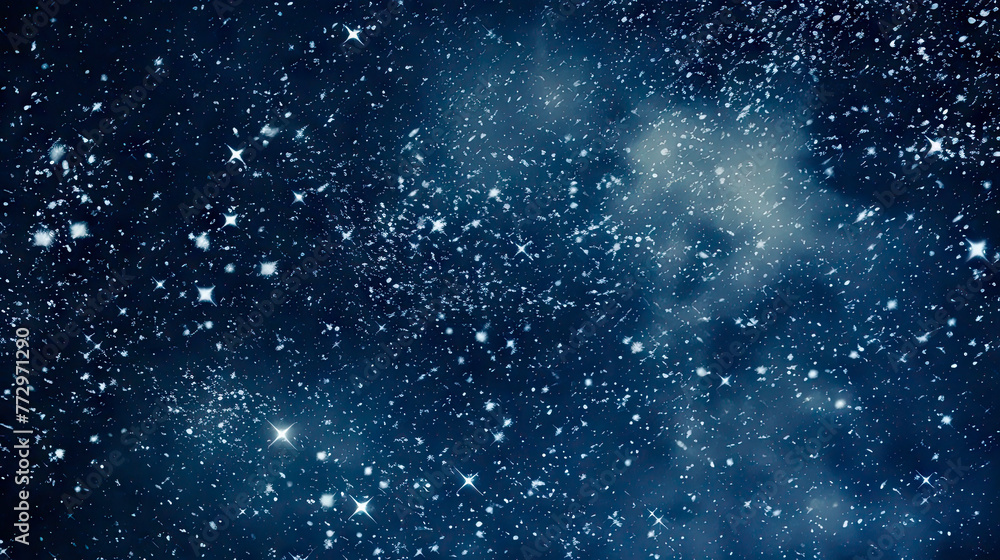 Snowy sky with stars, cloud, and falling snow overlay