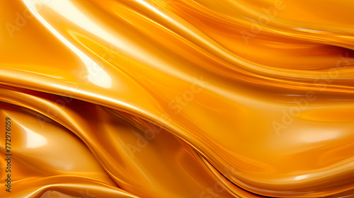 Smooth shiny gold fabric close-up background