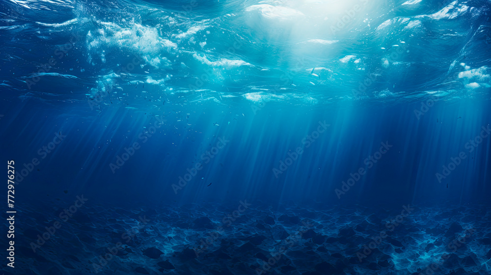 Sunlight filtering through deep blue ocean water