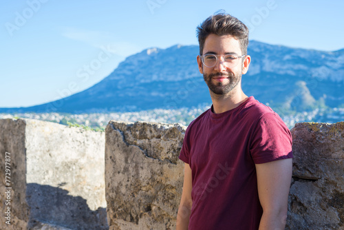 young man happy in the countryside