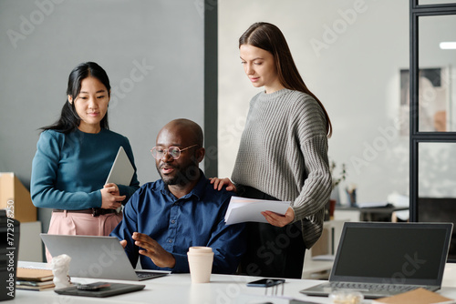 Multi-ethnic Team Discussing Business Strategy