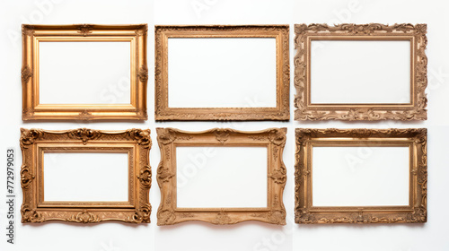 Antique gold frames hanging on a wall
