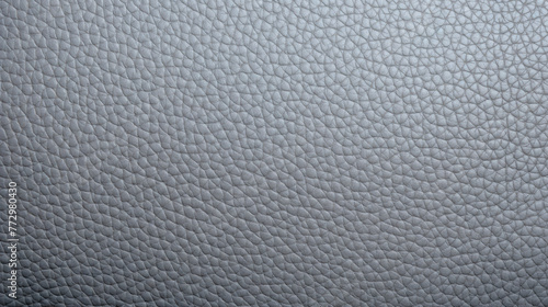 Close-up of leather surface featuring small squares pattern
