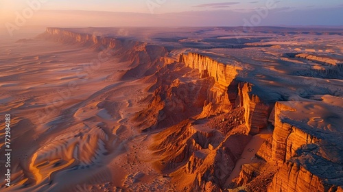 Aerial view of desert cliffs at sunset