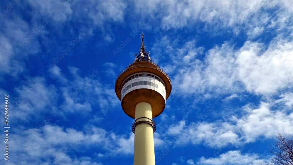Bremerhaven - radar tower - fantastic view from below of the impressive tower with clouds passing by Bremerhaven - radar tower - fantastic view from below of the impressive tower with clouds passing by