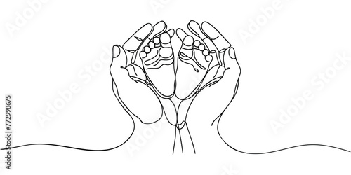 Hands holding the legs of a newborn drawn in one line