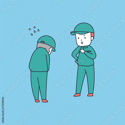 ミスしたスタッフを叱責する作業服の男性