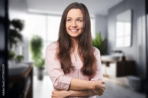 Young happy woman portrait posing at home
