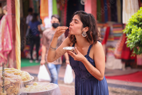 Woman Eating Pani Puri 
