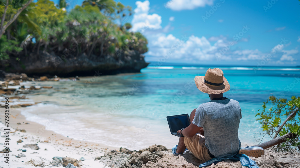 Nomad man sitting on beach with laptop, lifestyle, travel destinations, tropical climate, water