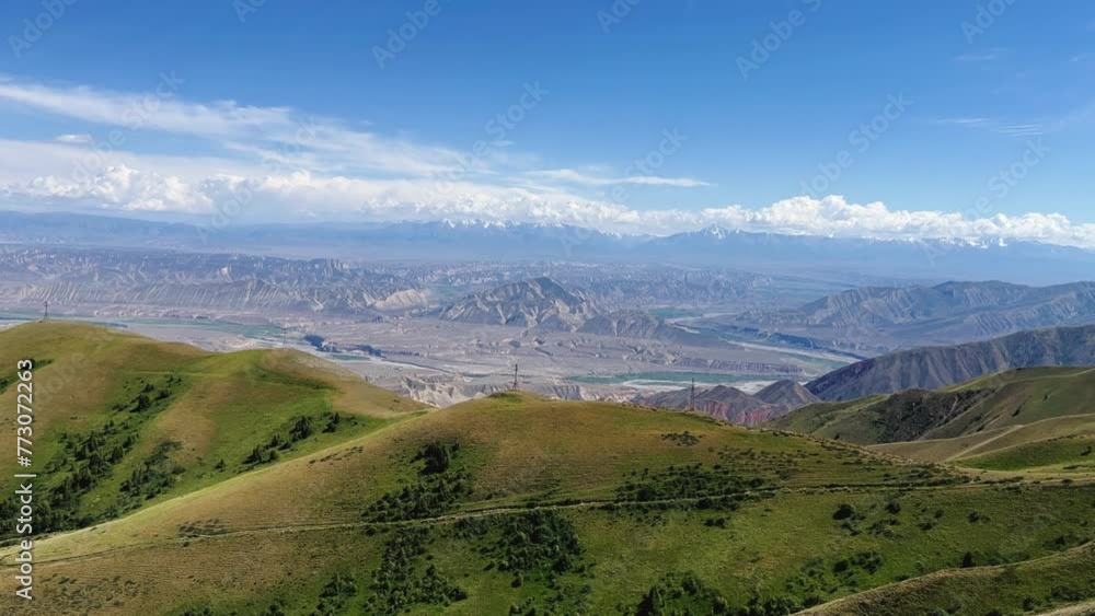 Toguz-Toro pass in Jalal-Abad region in western Kyrgyzstan. The Tien Shan and Pamir mountain systems. The highlands. View of the serpentine from the pass. 4К Toguz-Toro pass in Jalal-Abad region in western Kyrgyzstan. The Tien Shan and Pamir mountain systems. The highlands. View of the serpentine from the pass. 4К