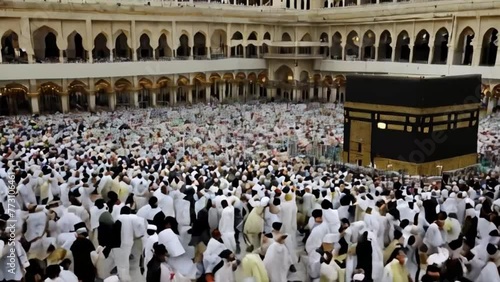 Muslim pilgrims circumambulate the Kaaba at Masjidil Haram in Makkah photo