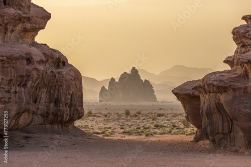 Picturesque desert landscape with rock formations of Tabuk, Neom at sunset photo