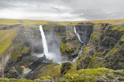 View from a side ledge on top of the valley of the Haifoss Waterfall in Iceland.