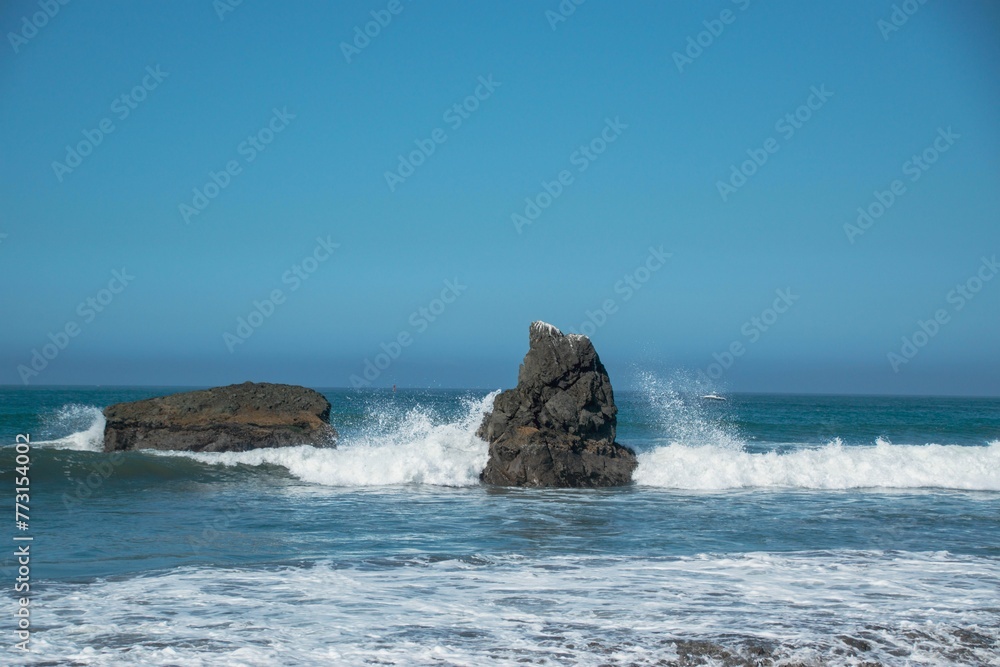 Scenic view of rocks in the sea on the Oregon coast in Brookings, Oregon Scenic view of rocks in the sea on the Oregon coast in Brookings, Oregon