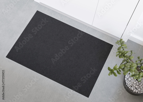 Sleek black doormat mockup in a contemporary setting, perfect for displaying logos or custom prints in a home or office entrance. Welcome mat with copy space. Doormat mock up. Carpet at entrance. 3D.