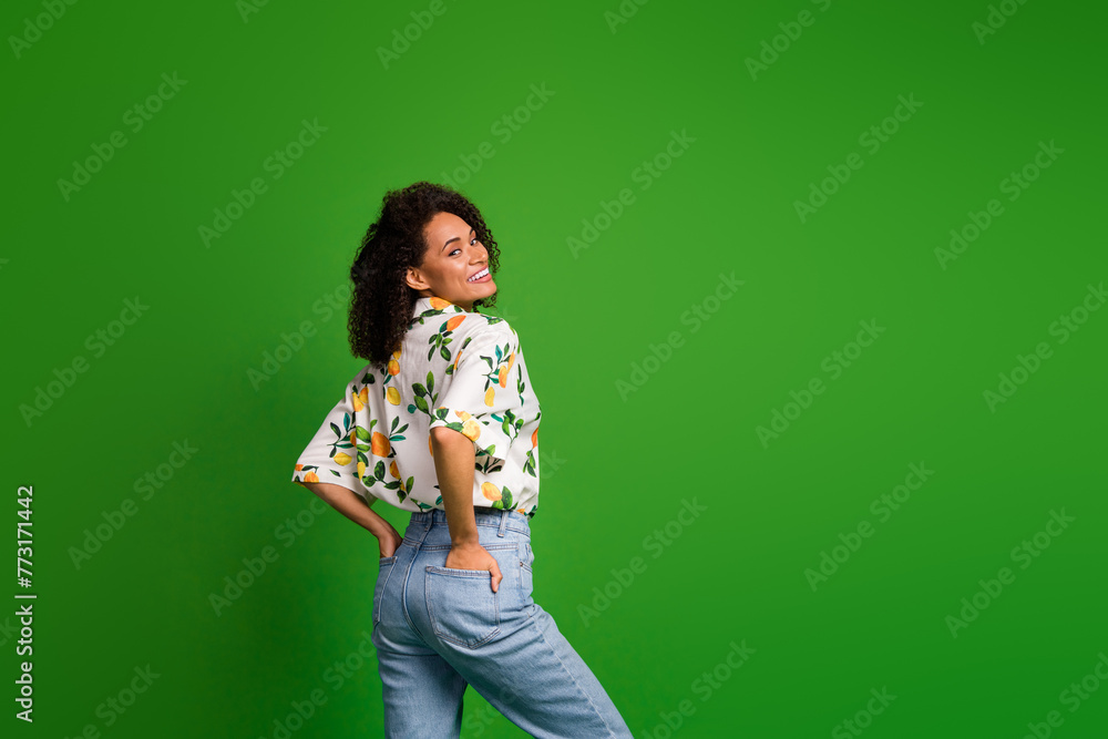 Photo of charming nice lady stand rear view posing for new sales isolated over bright color background Photo of charming nice lady stand rear view posing for new sales isolated over bright color background