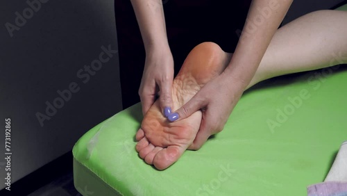 Foot massage with hands and fingers