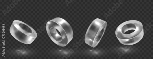 Crystal glass ring in different angle view. Abstract geometric shapes with reflection, crystal objects, graphic elements isolated on transparent black background.