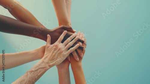 Diverse people stack support together