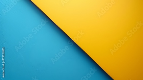 A striking abstract design with a clean diagonal separation of vibrant yellow and textured aqua..