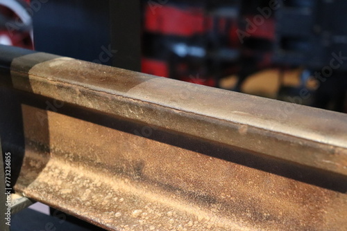 Railway steel rail close-up, steel texture. © Marat