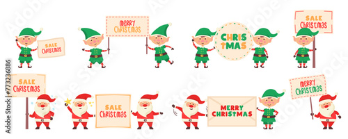 santa and elf holding a sign in their hands
