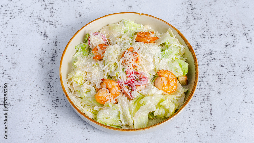 Prawns Caesar salad bowl isolated top view Prawns Caesar salad bowl isolated top view