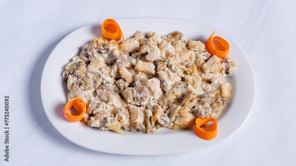 Chicken in yogurt sauce top view Chicken in yogurt sauce top view