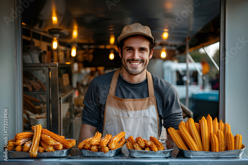 Young and handsome churro vendor selling churros from his food truck