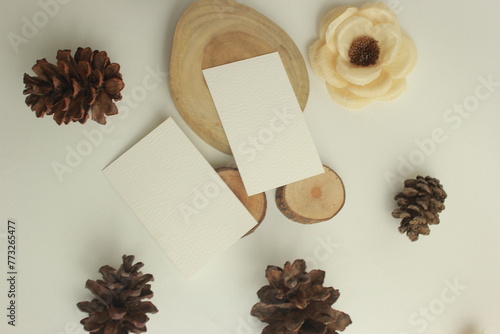 Blank paper for mockup business card decoration on a wooden background coffee and cinnamon