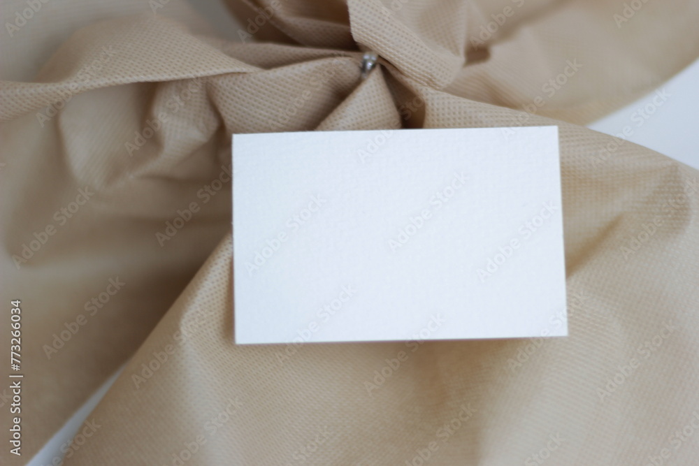 Blank paper for mockup business card decoration on a wooden background Blank paper for mockup business card decoration on a wooden background