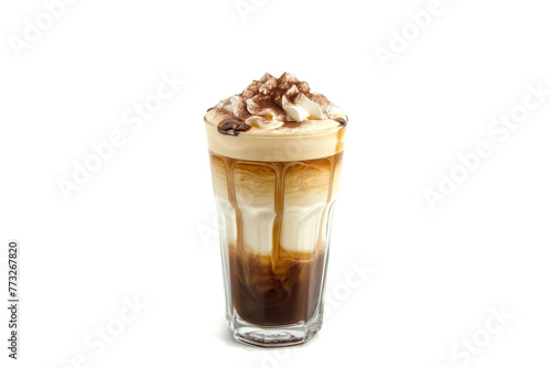 Iced caramel latte coffee in a tall glass with syrup and whipped cream isolated white background.