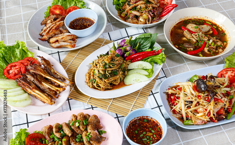 Traditional northeastern Thailand floods, Many variety various Isaan foods on a table.