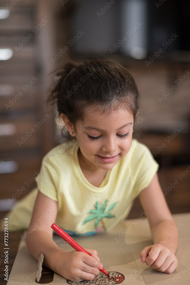 Little girl drawing at home Little girl drawing at home