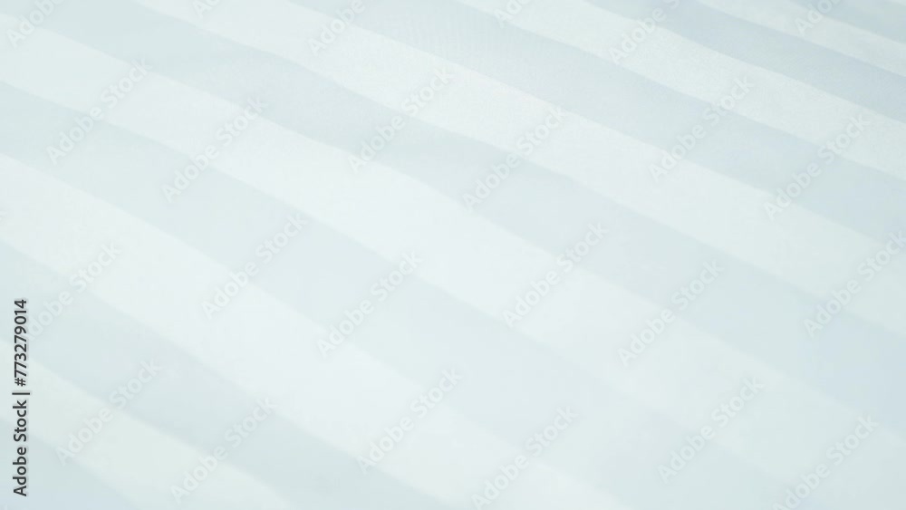Beautiful moving background of light color, waves on fabric Beautiful moving background of light color, waves on fabric
