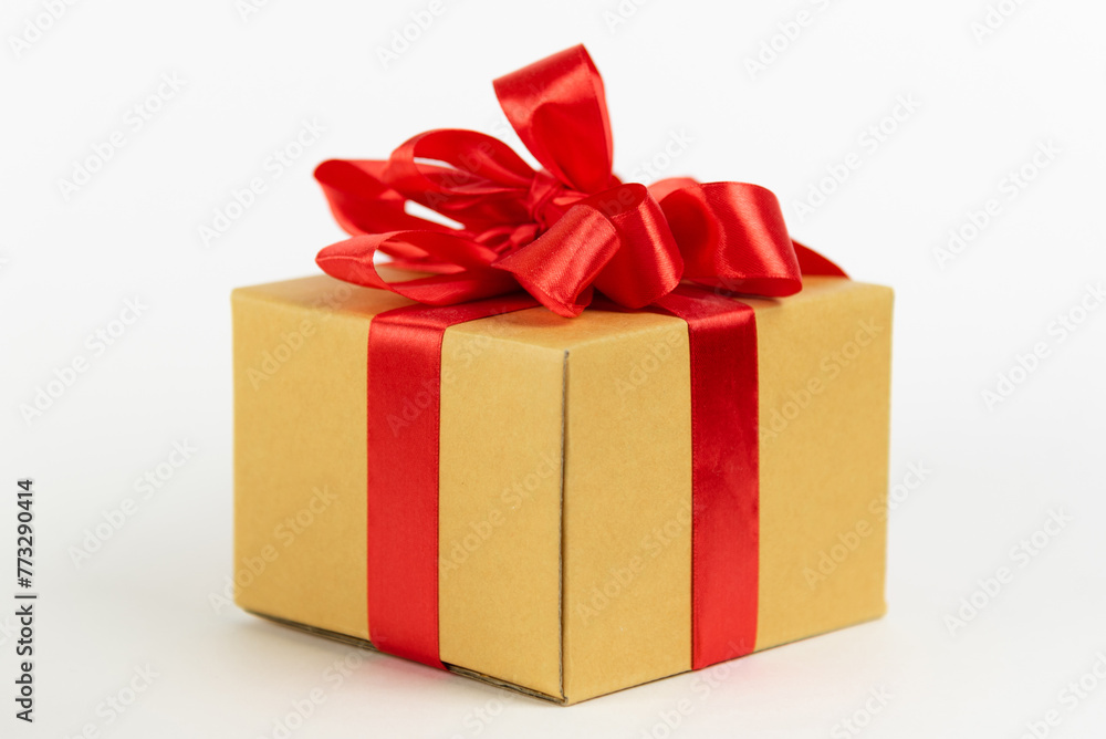 golden gift box isolated on a white background golden gift box isolated on a white background