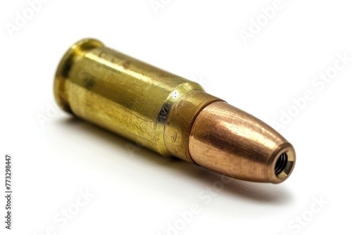 closeup of a bullet isolated on white background