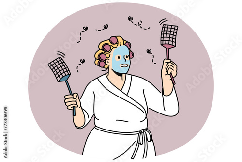 Funny overweight woman in bathrobe and mask on face beat insects with fly swatters. Anxious female chasing flies with special tool. Vector illustration.