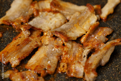 Close-Up of Meat Cooking on a Pan