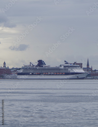 Modern cruiseship or cruise ship liner Summit arrival into Portland, Maine cruise port in New England for East Coast Indian summer cruising on family vacation