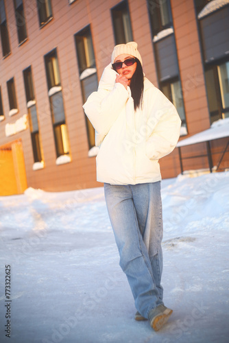 Woman in a white puffer